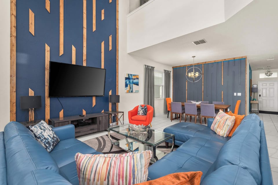 Living Room: Bright and airy space with stylish décor, perfect for family fun and relaxation!