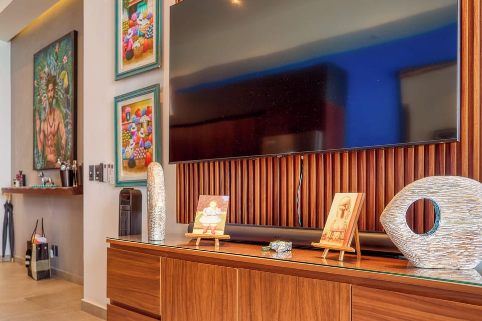 Smart TV and soundbar for your entertainment.