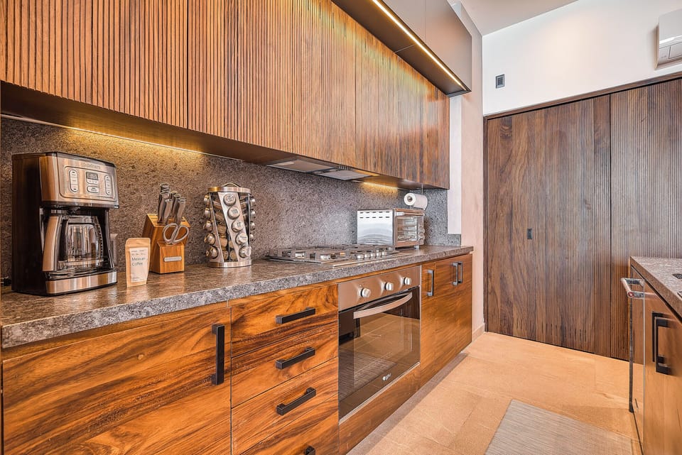 Fully equipped kitchen with breakfast bar and designer finishes.
