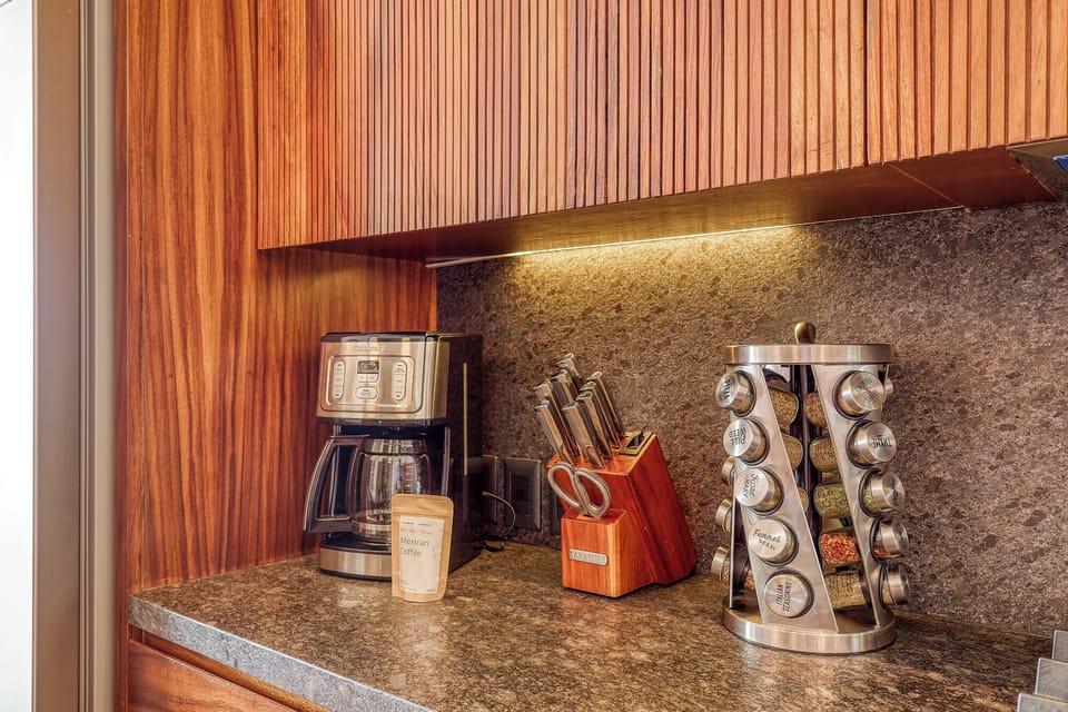 Modern appliances and thoughtful touches for cooking at home.