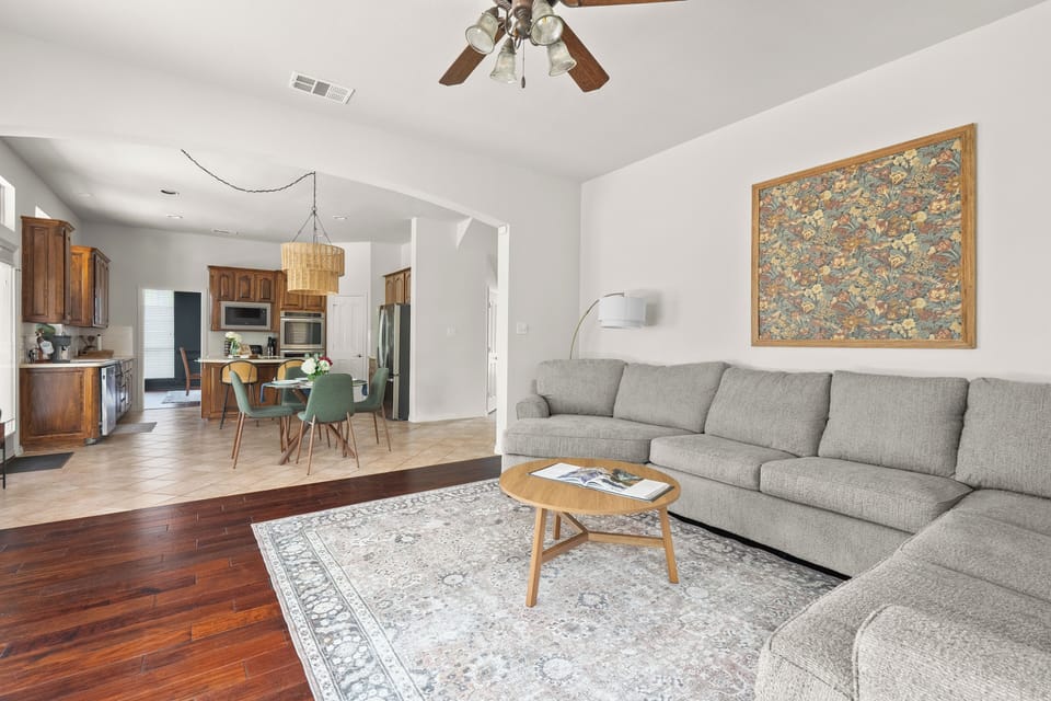 Enjoy the open concept floor plan while looking onto the resort-style backyard. 