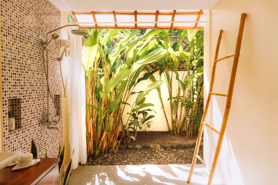 Room (Garden View) | Minibar, in-room safe, individually decorated, individually furnished