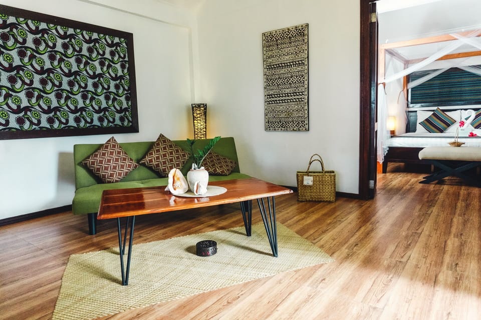 Deluxe Villa (Beach Front) | Living area | Flat-screen TV