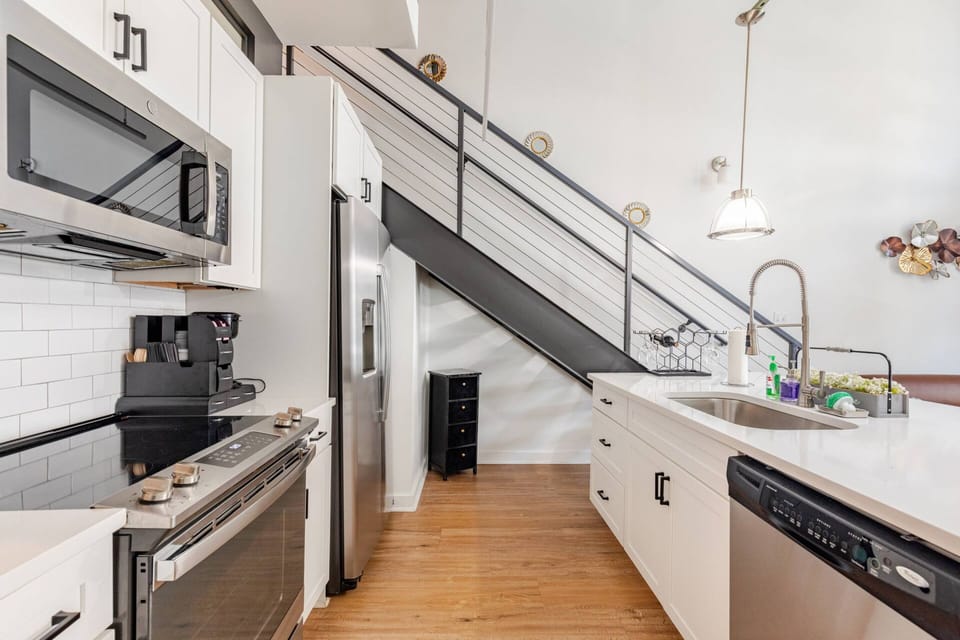 Bright kitchen island, fully stocked for your stay