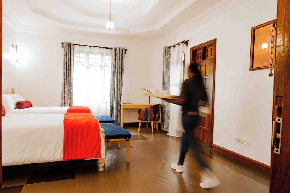 Deluxe Triple Room, Balcony, Courtyard View | Desk, laptop workspace, iron/ironing board (on request), WiFi (free)