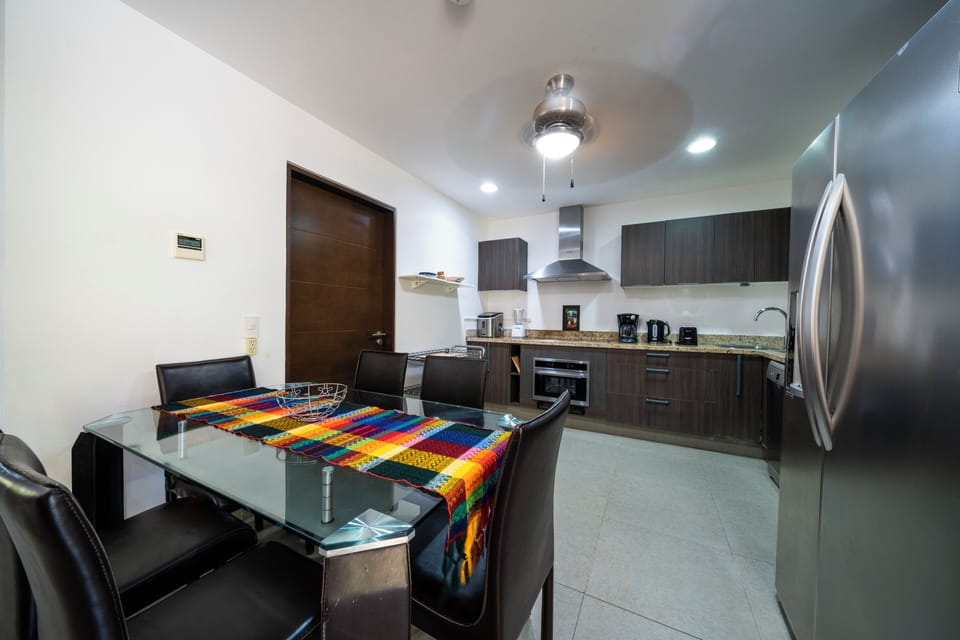 Deluxe Condo, Patio | Private kitchen