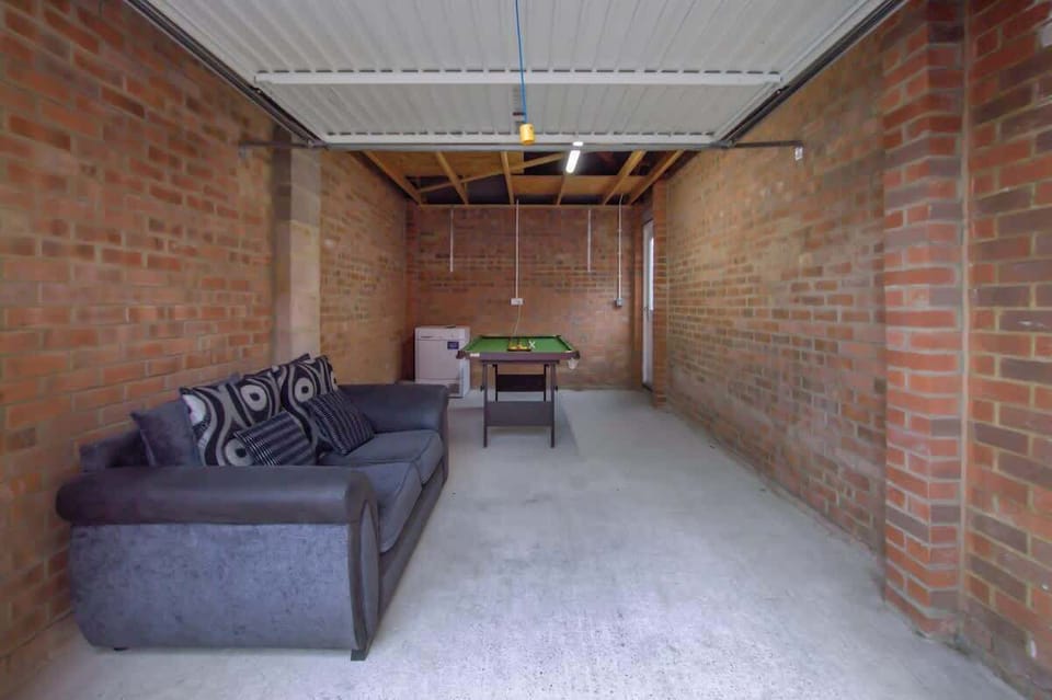 Games Area: Enjoy a game of pool in the garage games space.