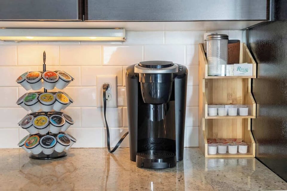 Start your morning with a fresh cup of coffee, just steps away in this fully stocked coffee bar!