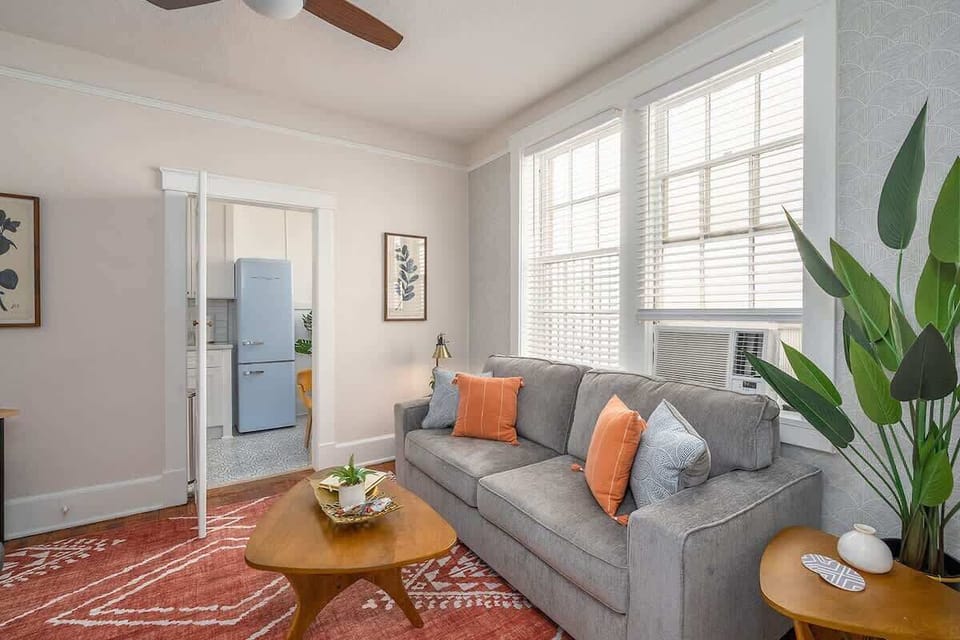 Cozy living room with smart TV to relax and stream your favorite shows after a long day exploring the city!