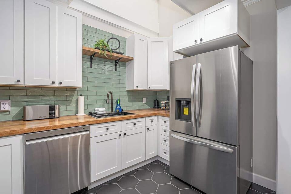 Channel your inner chef in our sleek and modern kitchen, equipped with everything you need to whip up delicious meals