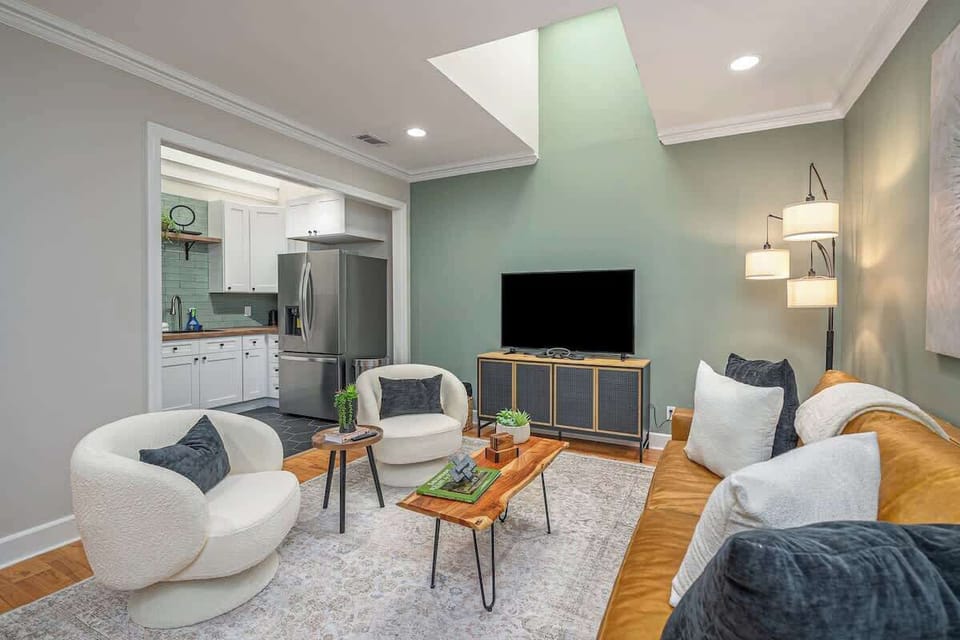 The spacious living room offers a comfortable place to relax, connect, and unwind after a day of exploring
