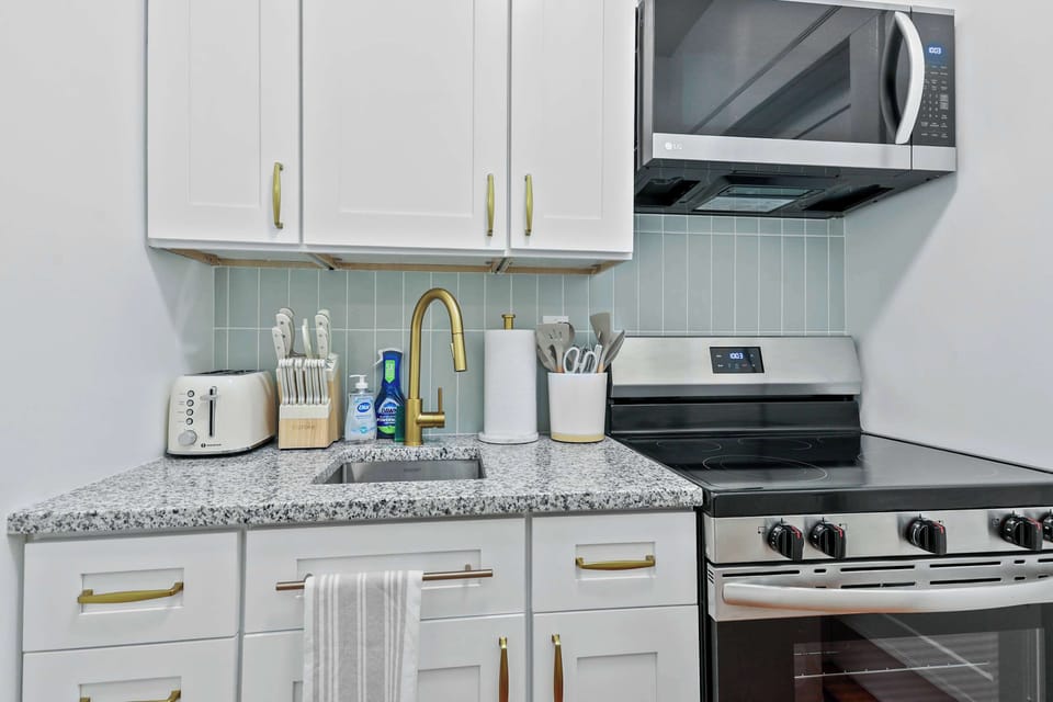 Stylish finishes and modern amenities make this kitchen both functional and enjoyable to use