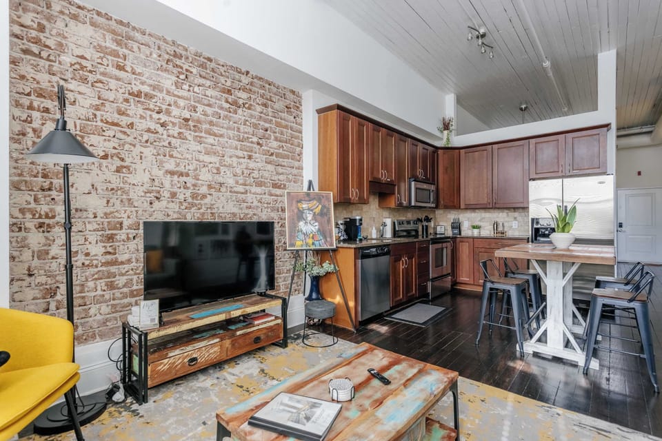 Relax in a space that feels both modern and effortlessly cozy.