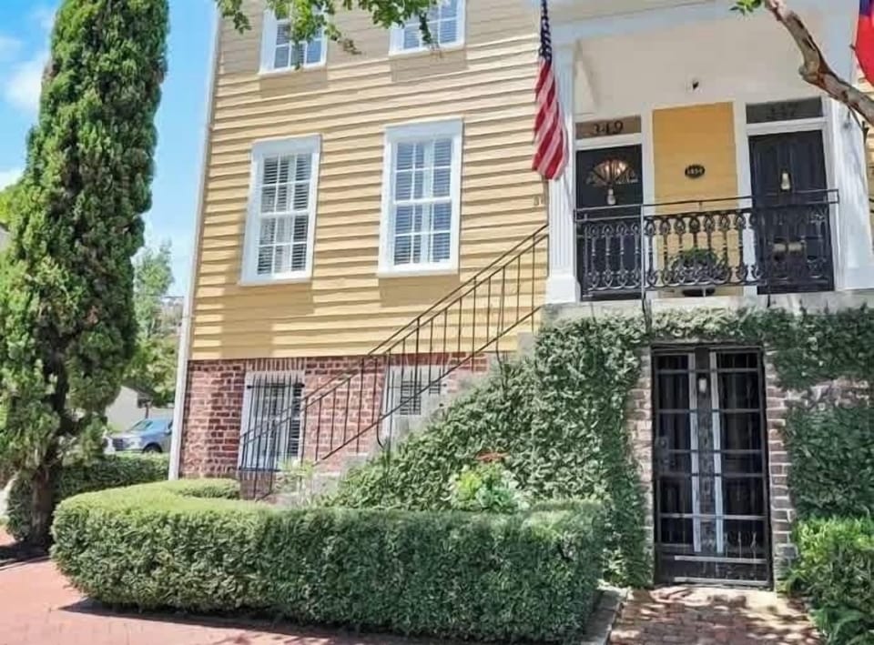 The apartment is accessed through the iron garden gate and then private keyless entry to the apartment door inside.