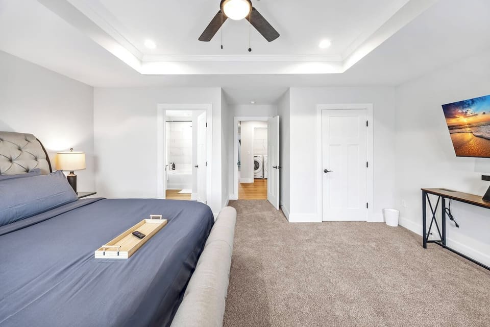 With direct access to the en-suite bath and walk-in closet, this room blends comfort, style, and practicality with ease.