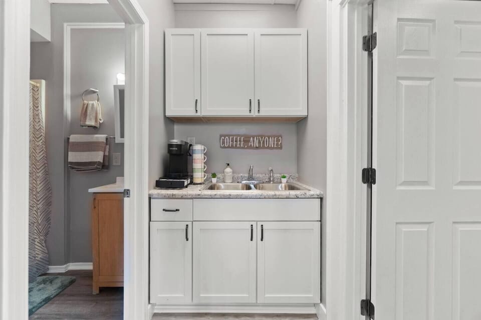 Discover our charming coffee nook, perfect for your morning brew or an afternoon pick-me-up.