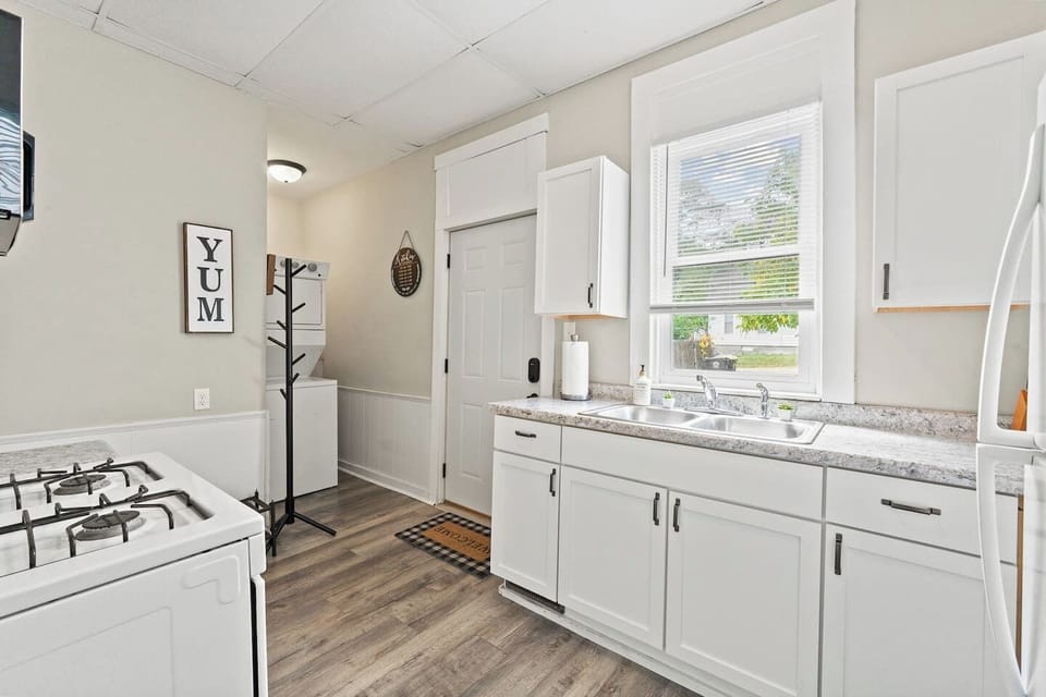 The kitchenette is well-stocked with a fridge, stove, and microwave for all your culinary needs.
