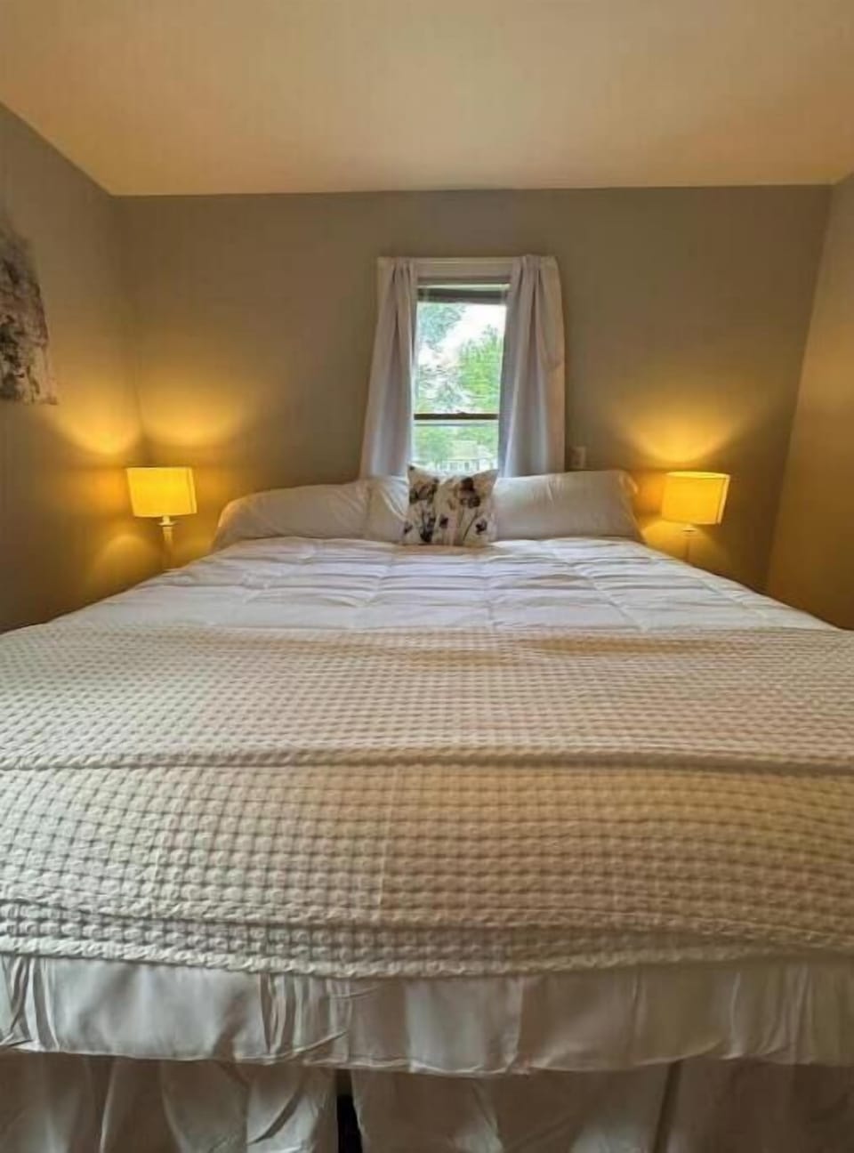 King size bed with plug ins available on both sides of bed.