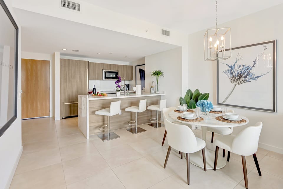 Kitchen + Dining | Provides counter seating for 3 and dining table for 4.