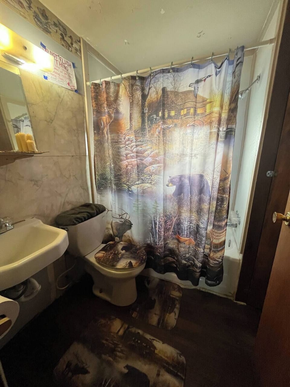 Community bathroom Immediately outside the apartment front door. 