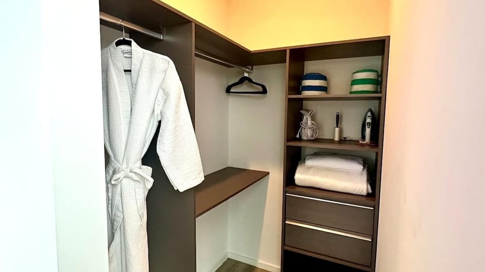 Waffle robe, Pool towels, Steamer  / Iron, Ironing board 
