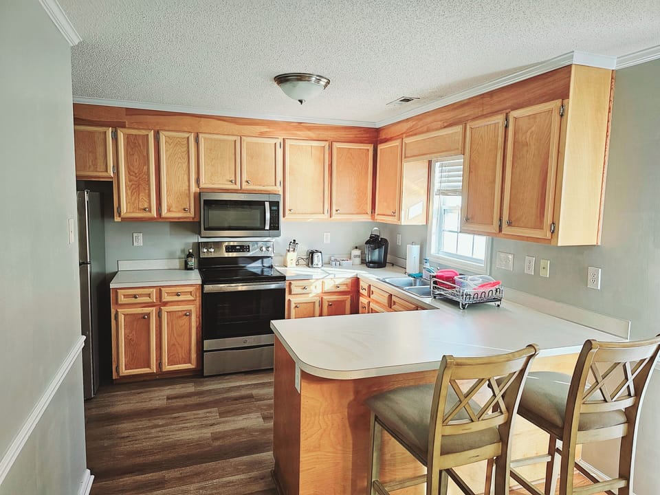Kitchen with stove and dishwasher