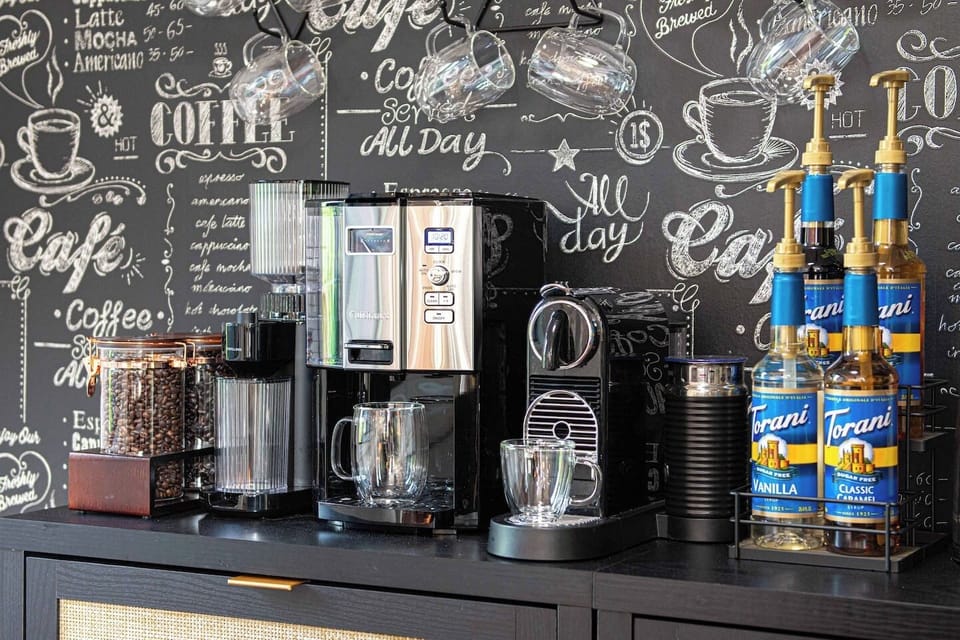 [Kitchen+Coffee Bar] ✨✨ Your morning fix is answered with this coffee, tea, and hot chocolate station! Drip coffee, espresso, a milk frother, sugar-free flavors, a variety of teas, and hot chocolate mix. Saves you the trip to a coffee shop.✨✨