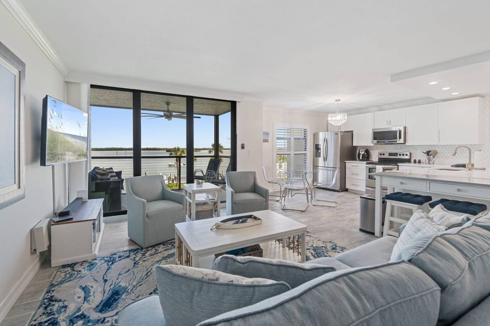 Relax on the couch and watch the boats and dolphins go by...
