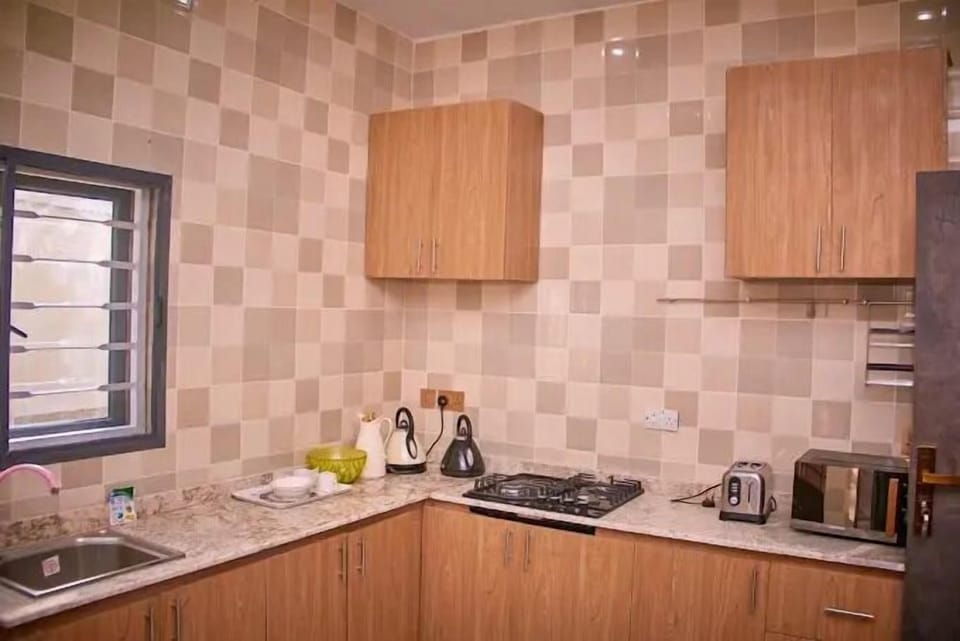 Economy Apartment, Balcony, City View | Private kitchen | Fridge, microwave, oven, stovetop