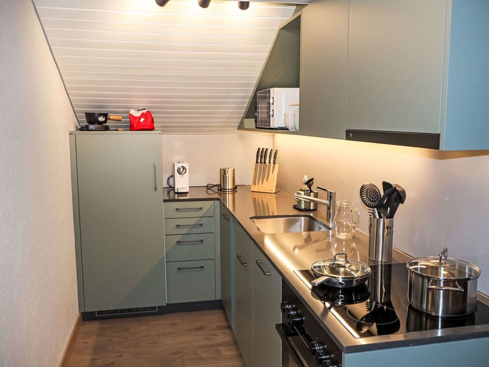 Kitchen, Countertop, Kitchen Appliance, Interior Design, Major Appliance, Cabinetry, Furniture, Flooring, Kitchen Sink, Plumbing Fixture