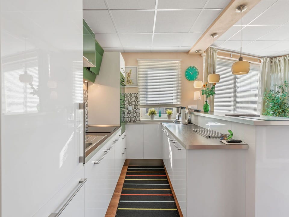 Kitchen, Countertop, Interior Design, Kitchen Appliance, Major Appliance, Cabinetry, Furniture, Flooring, Wood, Light Fixture