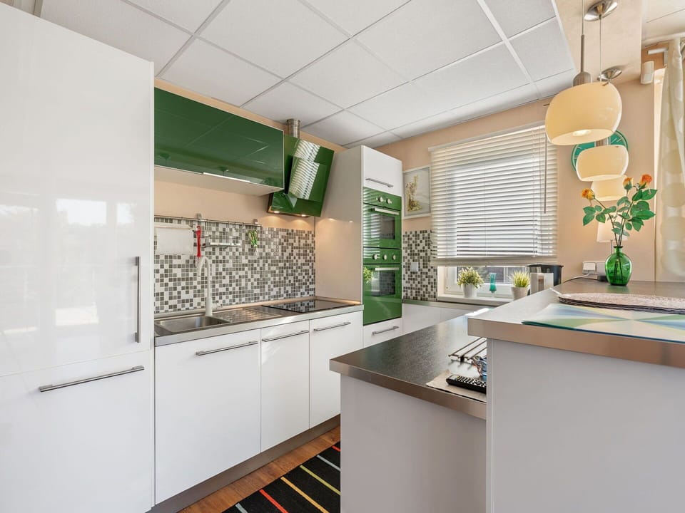Kitchen, Countertop, Kitchen Appliance, Interior Design, Cabinetry, Major Appliance, Flooring, Furniture, Ceiling, Kitchen Stove