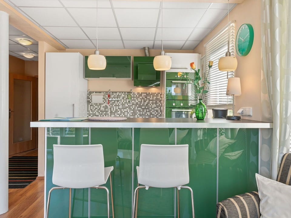 Furniture, Interior Design, Kitchen, Flooring, Countertop, Light Fixture, Wood, Cabinetry, Kitchen Appliance, Ceiling