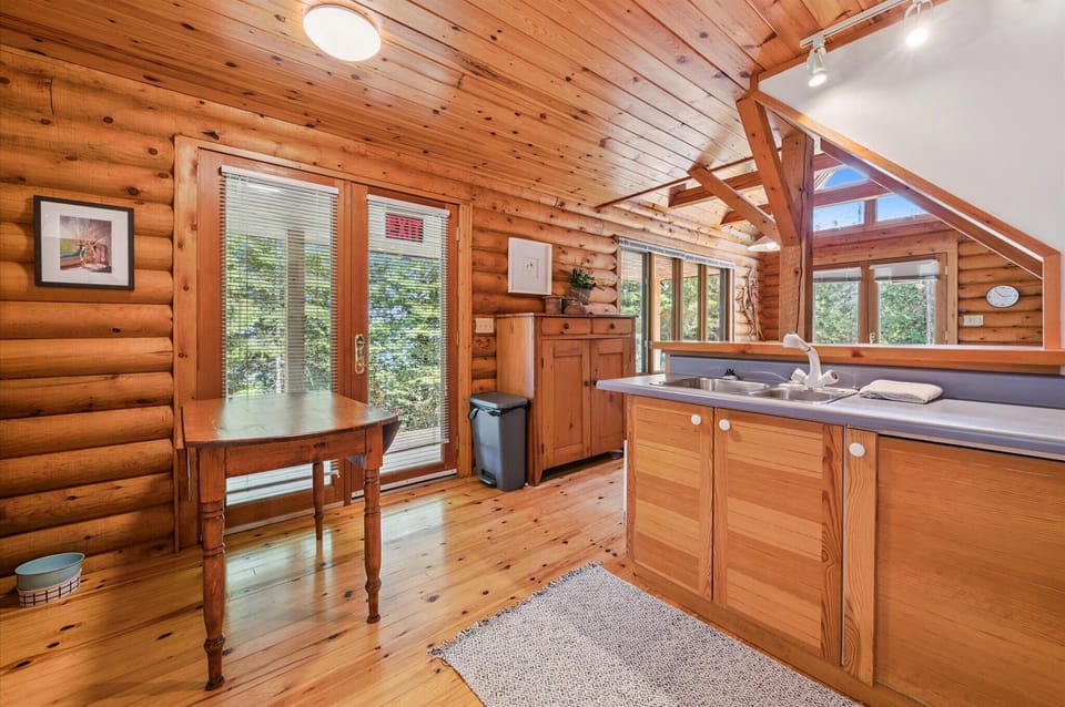 Enjoy breakfast with a view or step out to the deck for a peaceful start to your day surrounded by forest light.