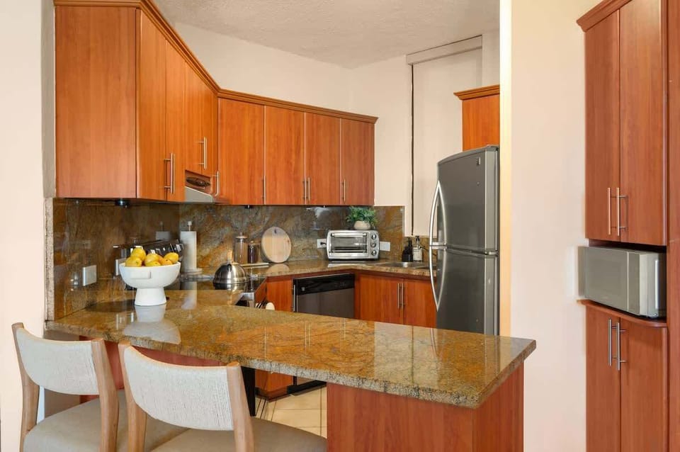 Fully equipped kitchen for preparing delicious meals with ease.

