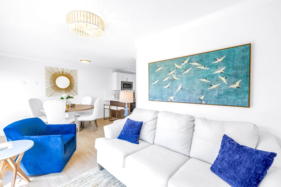 Living area open and sunny.