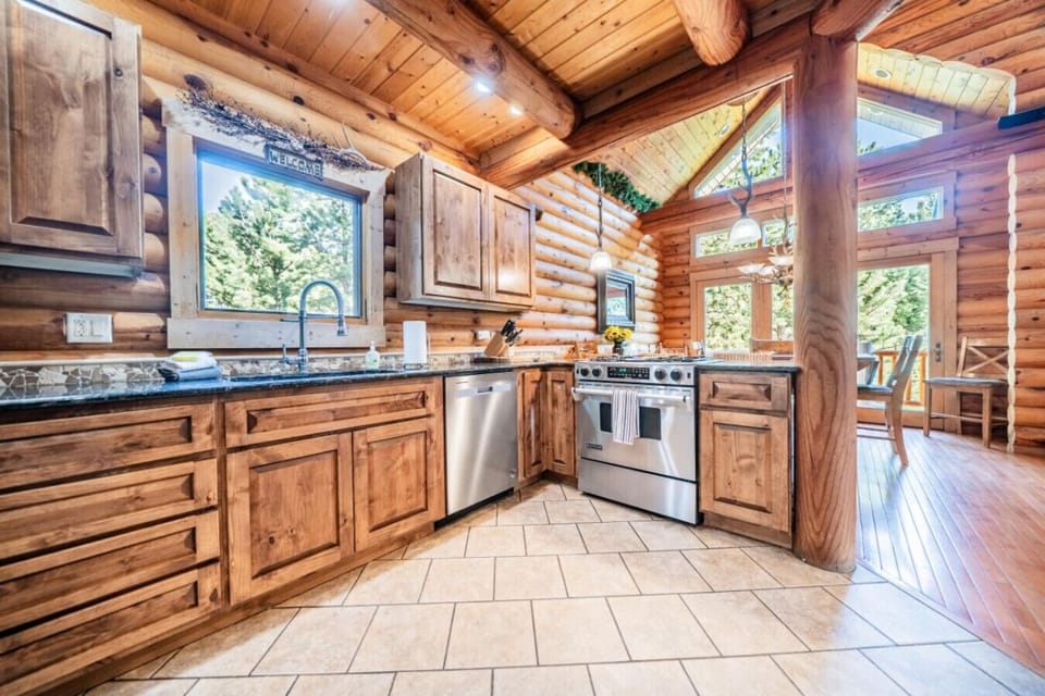 The kitchen flows into the dining room, with a bar top so people can socialize and cook at the same time.