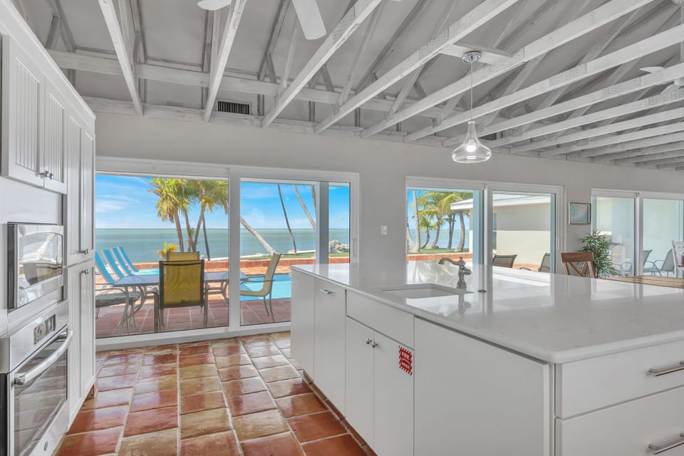 A fully equipped kitchen paired with views that make every meal special.