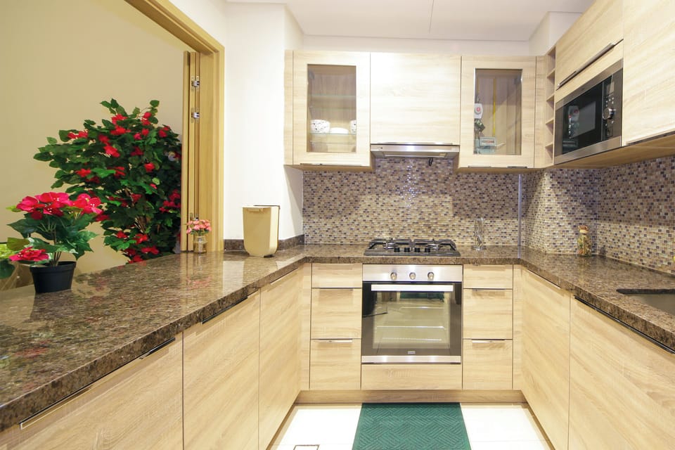 Apartment, Garden View | Private kitchen | Microwave, oven, stovetop, cookware/dishes/utensils