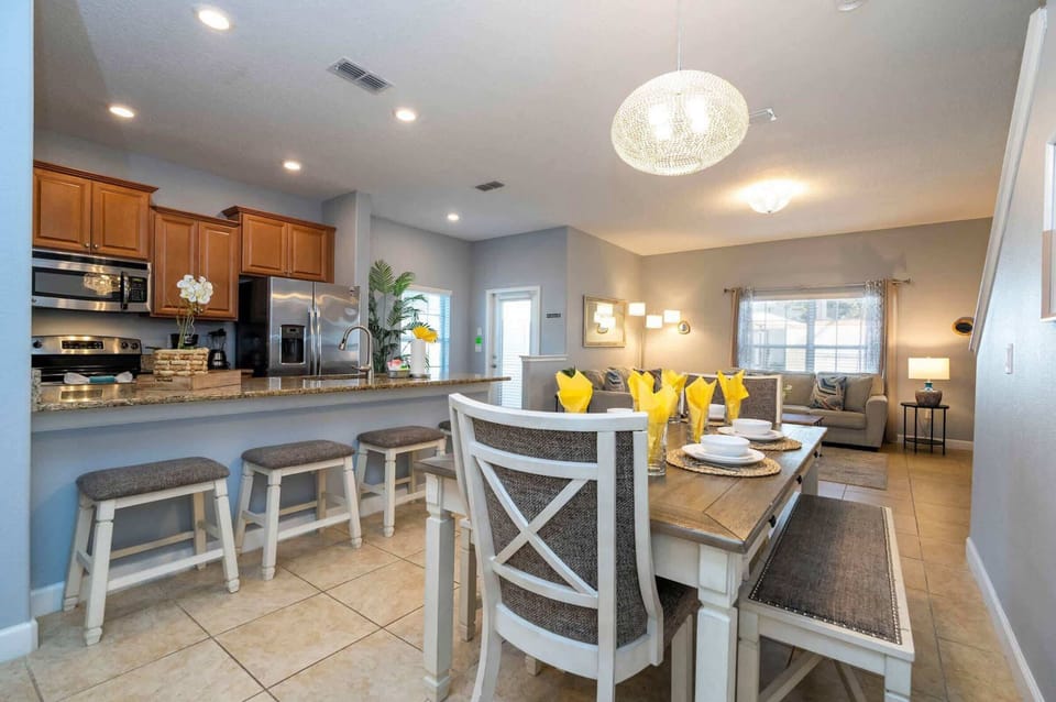 Dining table with seating for 8  and additional counter seating