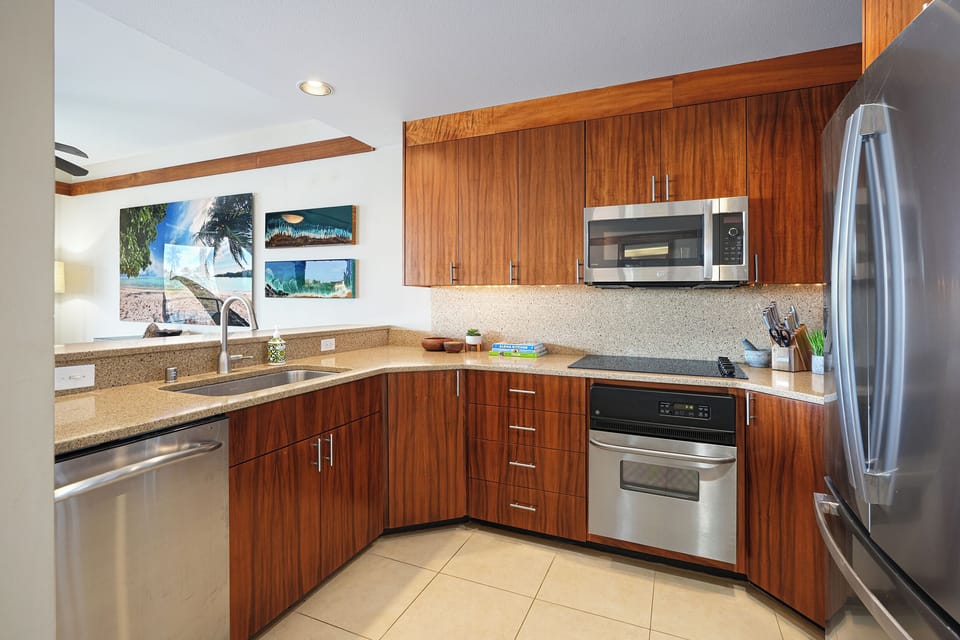 Kitchen is fully equipped with stainless steel appliances