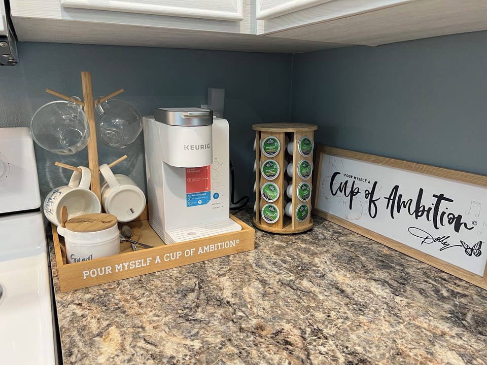 Coffee area, including a Keurig, fully stocked w/coffee & real sugar.