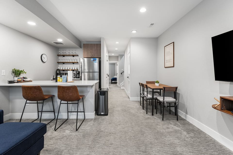 Enjoy a bright open layout with a modern kitchen and inviting dining area perfect for sharing meals.
