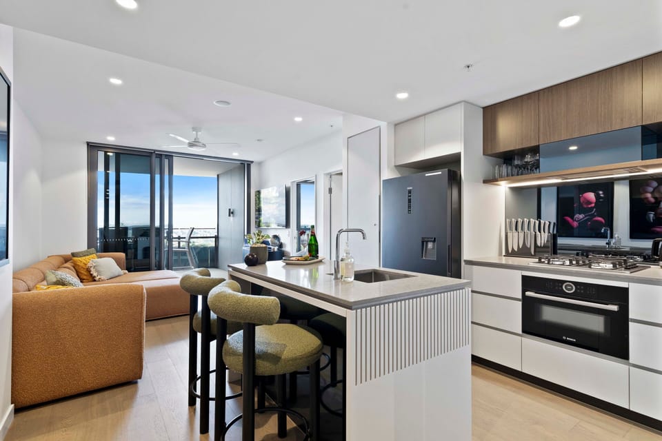 Fully equipped kitchen with premium appliances, ample storage, and Nespresso.