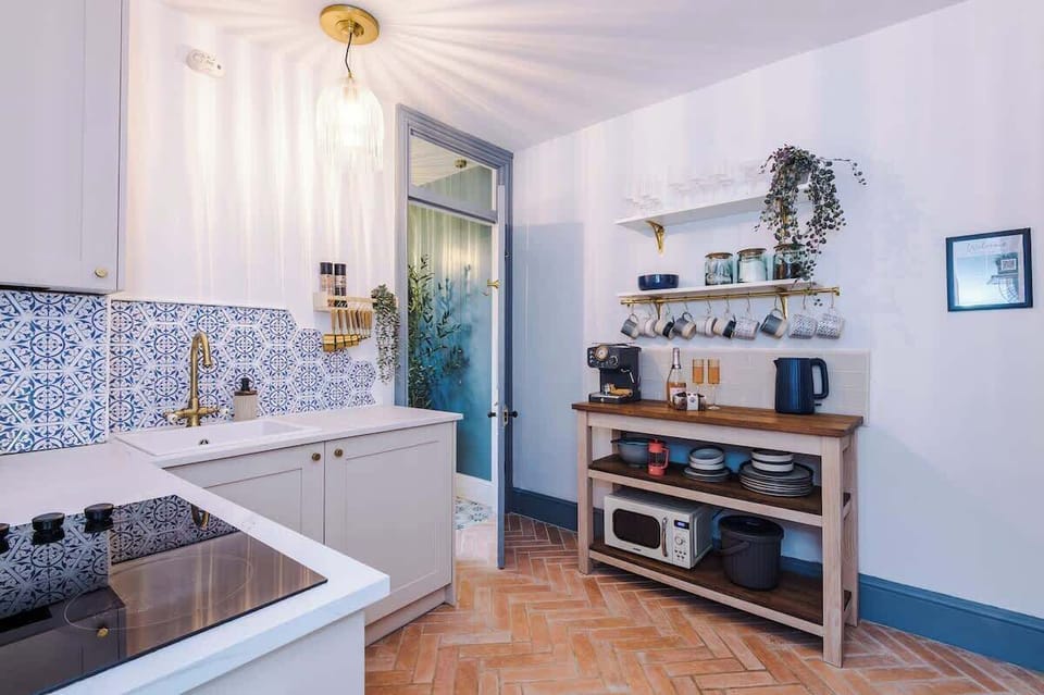 Bright, functional, and beautifully styled. Our kitchen is stocked with all the essentials you need to make yourself right at home during your stay.