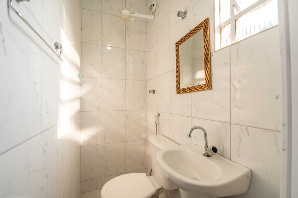 Economy Quadruple Room | Bathroom | Shower, free toiletries, towels, soap