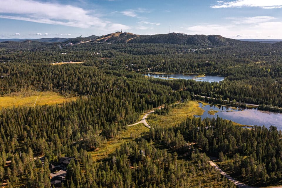 Panoramic view over the vast Finnish wilderness with Ruka fell on the horizon.