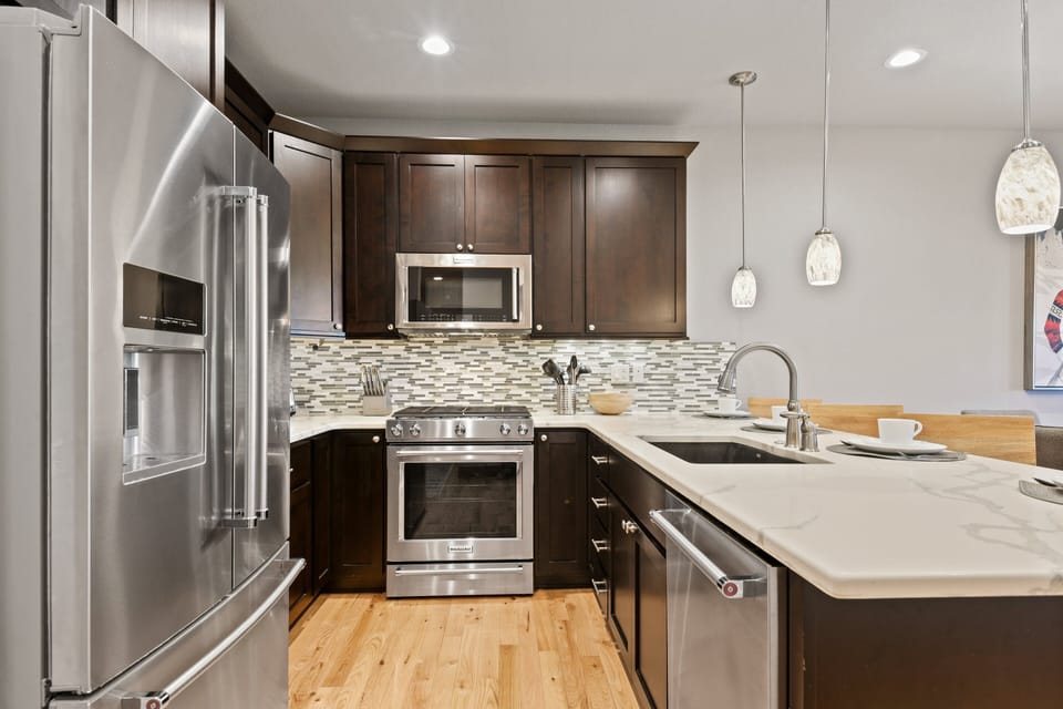 Fully Stocked Chefs Kitchen With Stainless Appliances