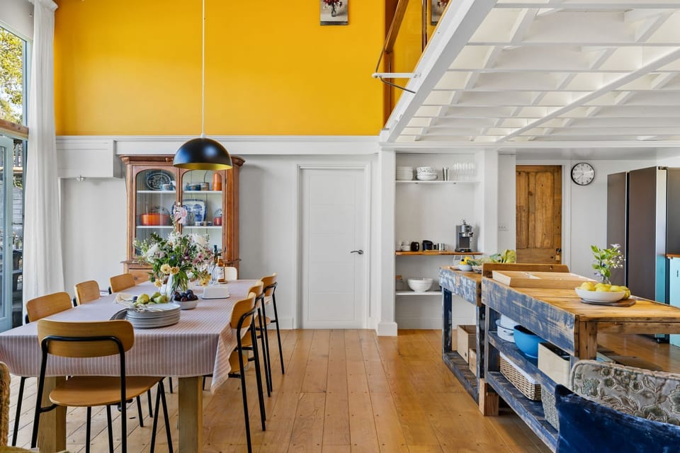 Dining area conveniently located next to kitchen - Master Shipwrights House