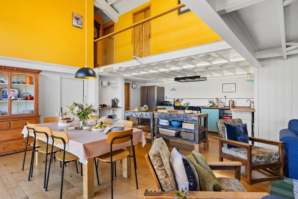 Living space leading into the dining and kitchen area - Master Shipwrights House